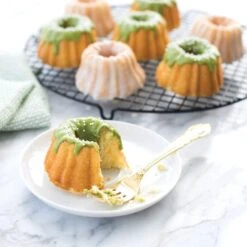 Nordic Ware Anniversary Bundtlette Pan -The Kitchen Supply Store 86237 bundtlette cut 780x780 04 1